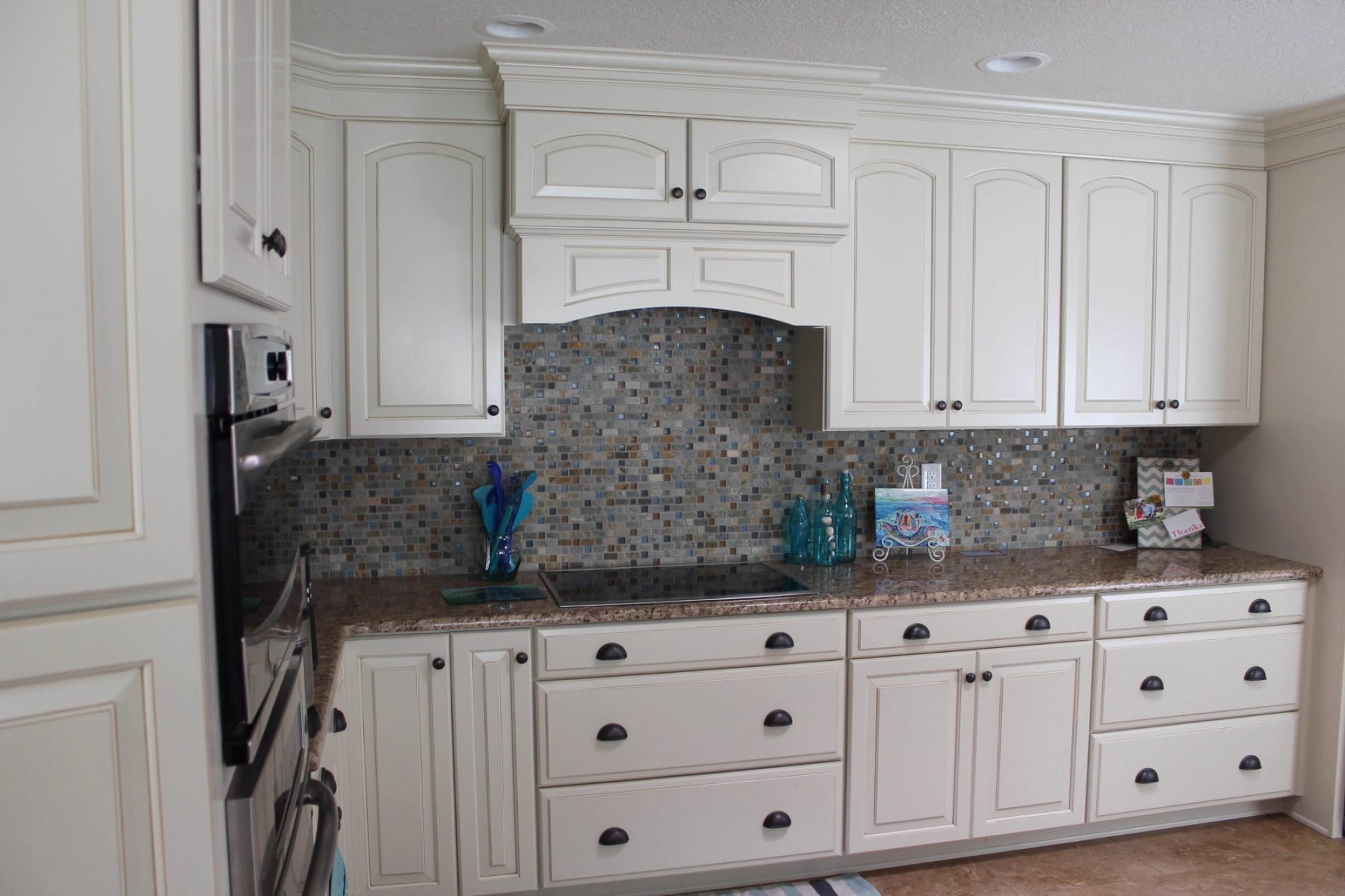 Hero background showing custom off-white kitchen cabinets